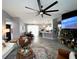 Open-concept living space with sleek floors and neutral tones offering versatile design options at 4854 Flamlau Ave, North Port, FL 34287
