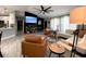 Cozy living room featuring modern design elements, open to the kitchen and dining areas at 4854 Flamlau Ave, North Port, FL 34287