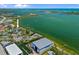 Stunning aerial view of waterfront property with boat slips and easy access to the open bay at 53 W Bay Heights Rd # 307, Englewood, FL 34223