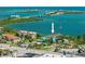 Aerial view showcases the condo's prime waterfront location with easy access to amenities and stunning ocean views at 53 W Bay Heights Rd # 307, Englewood, FL 34223