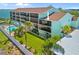 Beautiful condo building with waterfront views from the screened in balcony at 53 W Bay Heights Rd # 307, Englewood, FL 34223