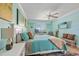 Bright bedroom features stylish decor, a comfortable bed, a workspace and a cozy seating area for relaxing and unwinding at 53 W Bay Heights Rd # 307, Englewood, FL 34223