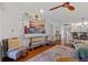 Inviting living area featuring a TV and seamless view to the kitchen and dining areas at 53 W Bay Heights Rd # 307, Englewood, FL 34223