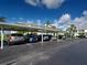 Community carport parking area, offering shade and protection for residents' vehicles at 5725 Greenwood Ave # 5103, North Port, FL 34287
