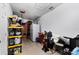 Garage interior with storage shelves, providing ample space for organization at 5983 Hobhill Ave, North Port, FL 34287