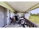 Spacious lanai providing an outdoor space for relaxation or hobbies at 5983 Hobhill Ave, North Port, FL 34287