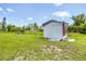 Storage shed in the backyard on a sunny day, great for extra storage at 5983 Hobhill Ave, North Port, FL 34287