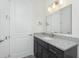 Well-lit bathroom with granite vanity, a sink, and recessed lighting at 609 Monaco Dr, Punta Gorda, FL 33950