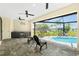 Covered lanai with an outdoor kitchen area, seating, and a clear view of the pool at 609 Monaco Dr, Punta Gorda, FL 33950