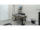 Modern office area shows a stylish desk, shelving unit, and neutral wall color at 609 Monaco Dr, Punta Gorda, FL 33950