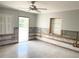 Spacious room with large window and ceiling fan awaiting personalized finishing touches at 617 W Olympia Ave, Punta Gorda, FL 33950