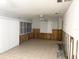 Spacious living room features tile flooring needing renovation at 617 W Olympia Ave, Punta Gorda, FL 33950