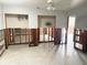 Spacious room shows wood framing with terrazzo flooring at 617 W Olympia Ave, Punta Gorda, FL 33950