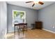 Comfortable bedroom featuring a window overlooking the neighborhood and a ceiling fan at 6382 Cutler Ter, Port Charlotte, FL 33981