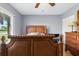 Bedroom featuring an ornate wooden bed frame and matching wood furniture at 6382 Cutler Ter, Port Charlotte, FL 33981