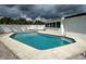 A well-maintained backyard pool offering a relaxing space for leisure and recreation at 6483 Fabian Rd, North Port, FL 34287