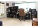 Spacious home office with tile floors, and desk areas at 6689 Gasparilla Pines Blvd, Englewood, FL 34224