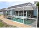 Enjoy the refreshing pool in the screened-in lanai at 6689 Gasparilla Pines Blvd, Englewood, FL 34224