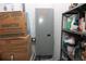 Neatly organized storage area featuring shelving units, and an electrical box at 6689 Gasparilla Pines Blvd, Englewood, FL 34224