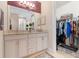 Granite countertop and walk-in closet enhance this bathroom's features at 8081 Dimstead St, Port Charlotte, FL 33981
