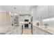Modern kitchen featuring white cabinetry, stainless steel appliances, and granite countertops at 8081 Dimstead St, Port Charlotte, FL 33981