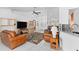 Spacious living room with tile floors, high ceilings, and neutral decor at 871 Columbia St, Port Charlotte, FL 33948
