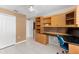 Office space features built-in shelving, a desk, and a closet at 871 Columbia St, Port Charlotte, FL 33948