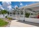 A screened-in pool and patio offer the perfect spot for outdoor entertaining at 871 Columbia St, Port Charlotte, FL 33948