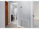 Bathroom with a shower, toilet, and dark wood cabinet sink at 879 E Seminole Dr, Venice, FL 34293
