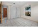 Bedroom featuring a window and closet at 879 E Seminole Dr, Venice, FL 34293
