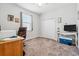 Cozy bedroom features a large window and a closet for plenty of storage at 1275 Blue Lake Cir, Punta Gorda, FL 33983
