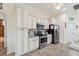 Bright kitchen featuring stainless steel appliances and sleek cabinetry at 1275 Blue Lake Cir, Punta Gorda, FL 33983