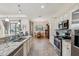 Well-equipped kitchen with stainless steel appliances and granite countertops at 1275 Blue Lake Cir, Punta Gorda, FL 33983