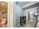 Walk-in closet connecting the main bedroom to the ensuite bath and toilet room at 1375 Saxony Cir # 124, Punta Gorda, FL 33983