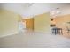 Spacious living area with tile floors, providing ample space for various furniture arrangements at 14311 Reserve Ct, Port Charlotte, FL 33953