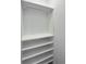 Open closet featuring shelving for clothing and accessories at 14520 Edna Cir, Port Charlotte, FL 33981