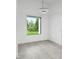 Modern office with large window overlooking the lawn at 14520 Edna Cir, Port Charlotte, FL 33981