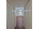 Bedroom view features hardwood floors and white doors at 15117 Lyneburg Ave, Port Charlotte, FL 33981