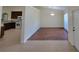 Inviting dining area with tile flooring adjacent to an open kitchen at 15117 Lyneburg Ave, Port Charlotte, FL 33981