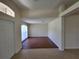 Open-concept entryway with tile flooring leading into a spacious, bright room at 15117 Lyneburg Ave, Port Charlotte, FL 33981