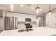 Kitchen features white cabinetry, stainless steel appliances, and modern lighting at 16403 Perdida Ct, Punta Gorda, FL 33955