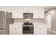 Well-equipped kitchen featuring stainless steel appliances and ample counter space at 16403 Perdida Ct, Punta Gorda, FL 33955