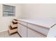Bright kitchen features cabinets, drawers, countertops and a window at 17125 Canary Ln, Port Charlotte, FL 33948
