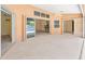 Large lanai with ceiling fan provides access to the living room and an additional flex space at 17125 Canary Ln, Port Charlotte, FL 33948