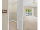 Walk-in closet offers a view of the pool from the adjacent bedroom at 17125 Canary Ln, Port Charlotte, FL 33948