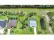 Expansive lot with mature trees and water features providing privacy and natural beauty for this property at 1722 Amnesty Dr, North Port, FL 34288