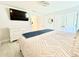 Spacious bedroom includes a closet, dresser, and bathroom access for convenience at 17344 York Ave, Port Charlotte, FL 33948