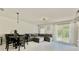 Open-concept living room with modern furniture and lots of natural light at 17344 York Ave, Port Charlotte, FL 33948