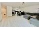 Open-concept living room with modern furniture and lots of natural light at 17344 York Ave, Port Charlotte, FL 33948