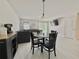 Open-concept living room with modern furniture and lots of natural light at 17344 York Ave, Port Charlotte, FL 33948